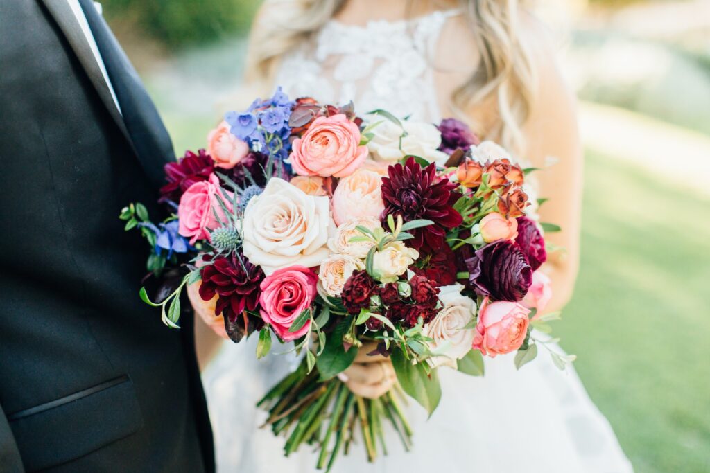 a colofull jewel tone bouquet for vineyard wedding on the central coast 